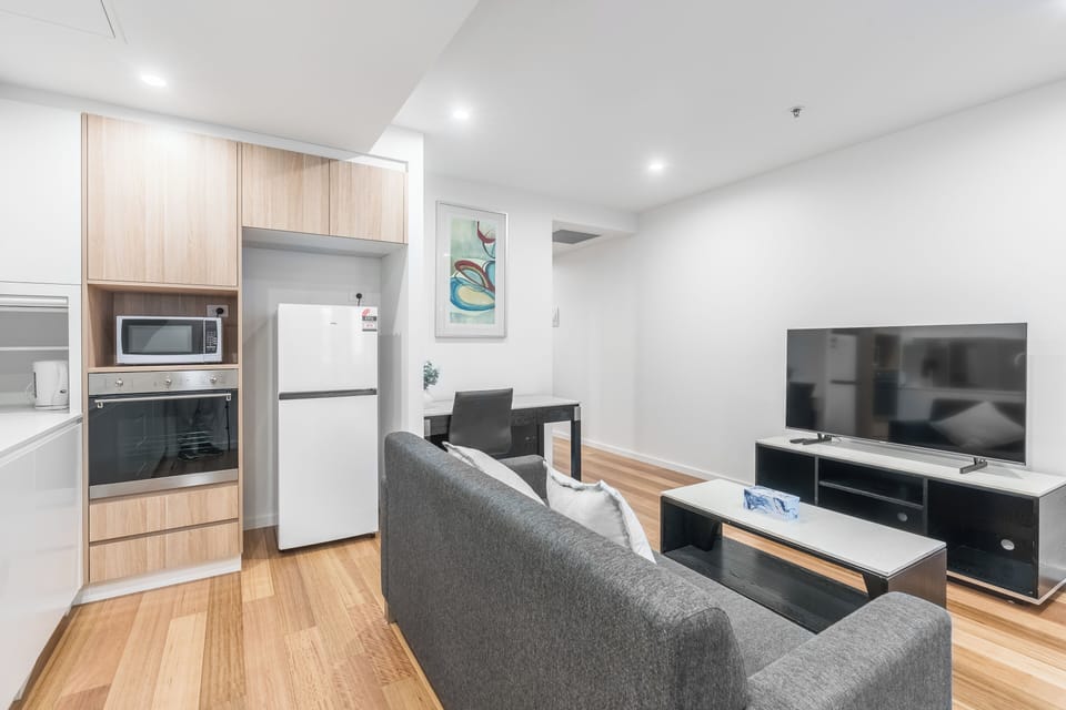 Economy Apartment | Living area | TV