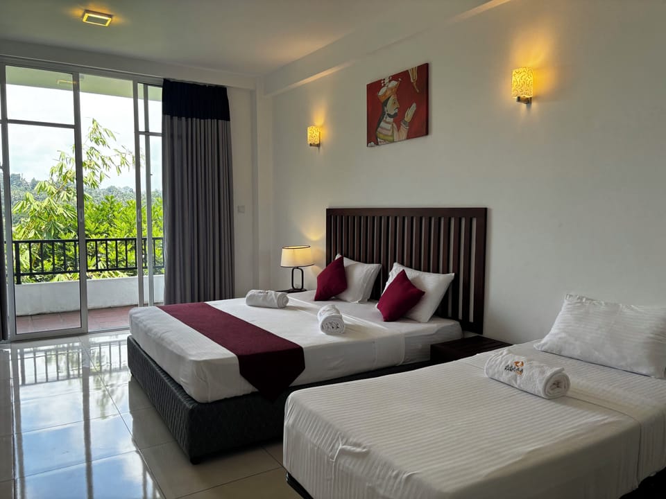 Deluxe Triple Room, Balcony | Desk, WiFi (free)