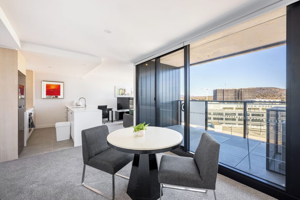 Comfort Apartment | Living area | Flat-screen TV