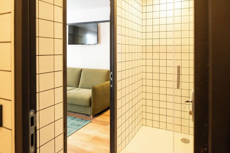 Family Quadruple Room | Bathroom | Towels, soap, shampoo, toilet paper