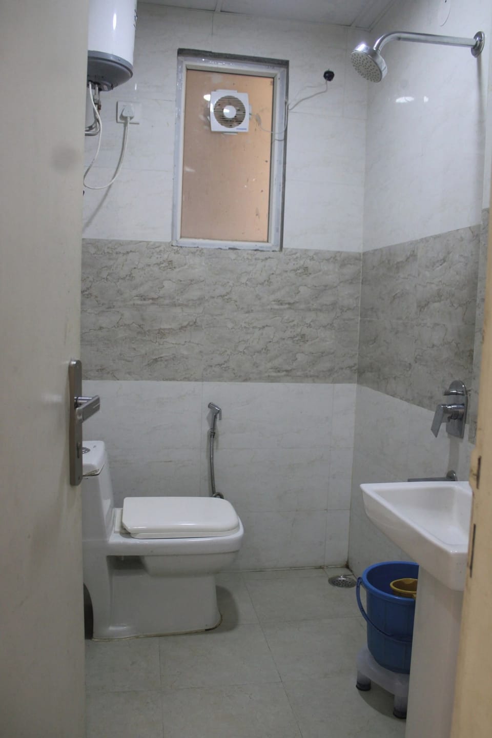 Double Room, City View | Bathroom | Shower, slippers, towels, soap