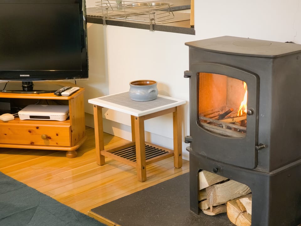  Taigh M'athair living room with log burner