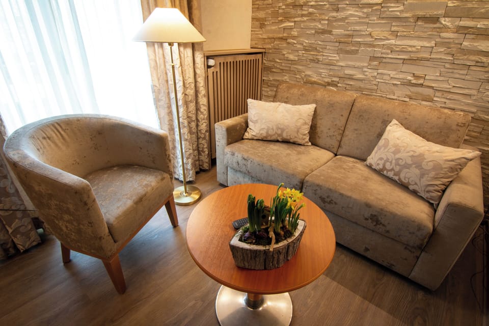 Superior Suite | Minibar, in-room safe, iron/ironing board, free cribs/infant beds