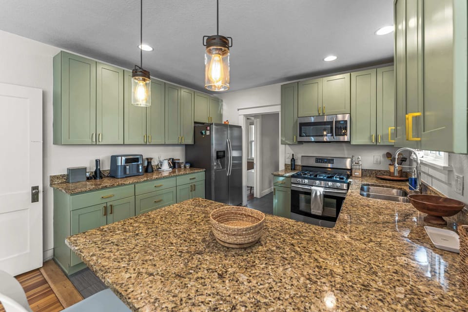 The kitchen is fully stocked with cookware, dishes and drinkware so you can enjoy a home cooked meal.