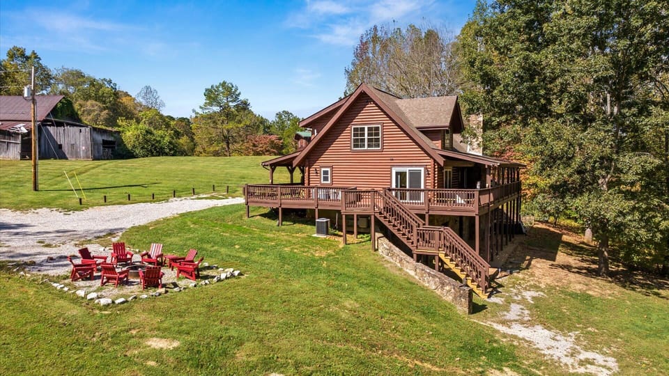 Cozy cabin vibes with a glowing firepit—perfect for outdoor gatherings.