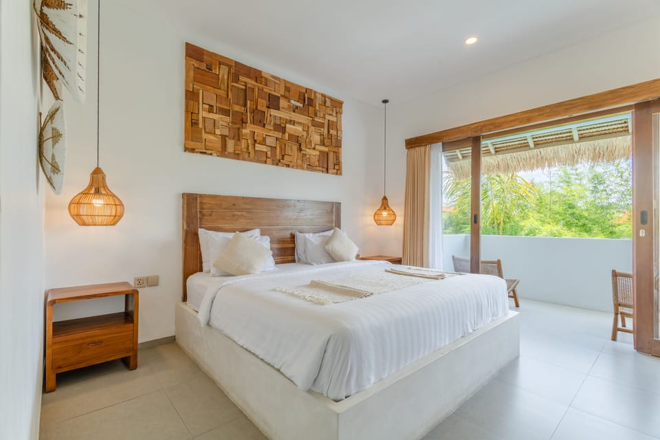 Deluxe Suite, Pool View | Premium bedding, minibar, in-room safe, desk