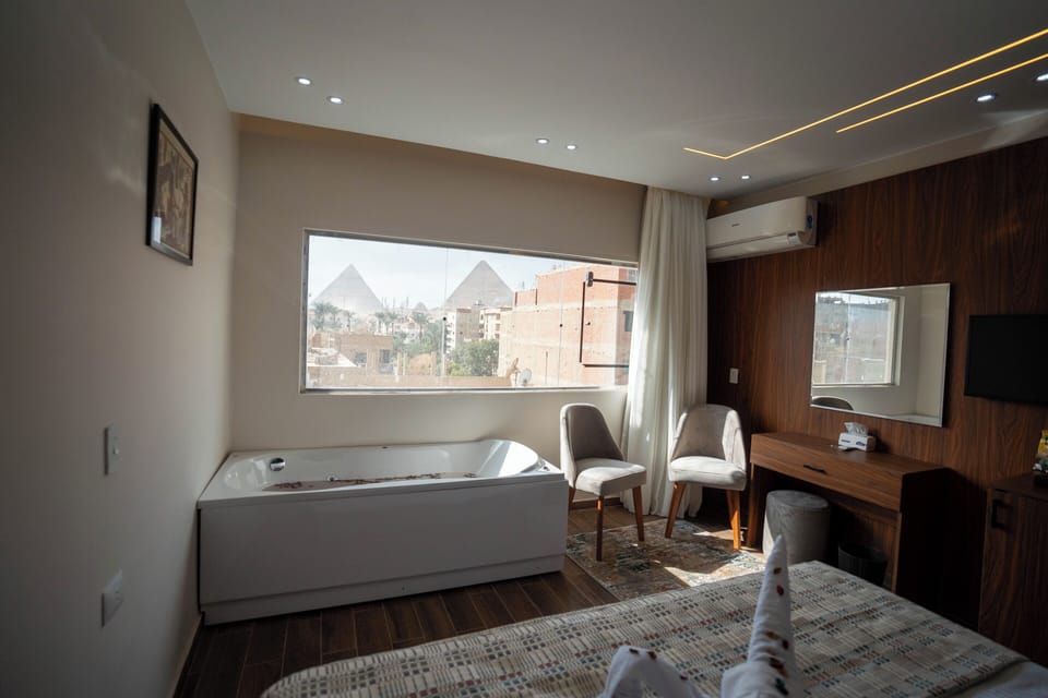 Queen Room with Jacuzzi & Pyramids View | View from room