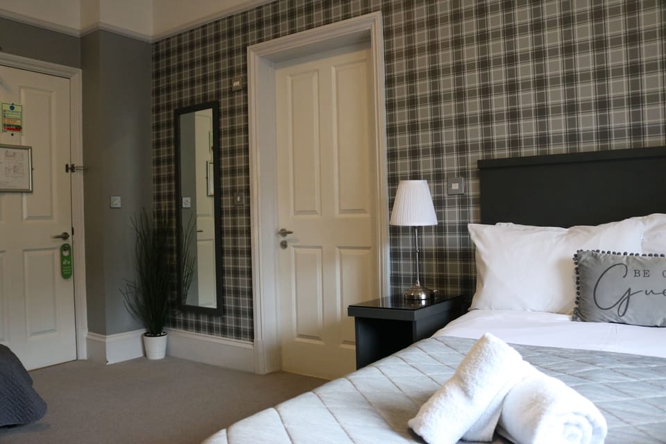 Family Triple Room, Non Smoking | Laptop workspace, iron/ironing board, free WiFi, bed sheets