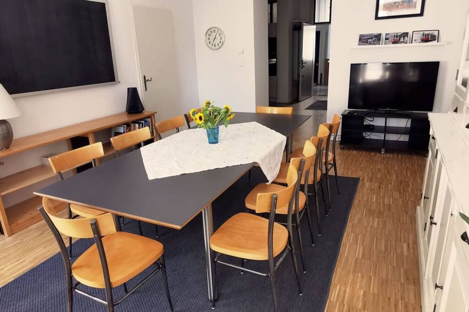 Apartment, Courtyard View | Living area | 120-cm flat-screen TV with digital channels, video-game console, toys