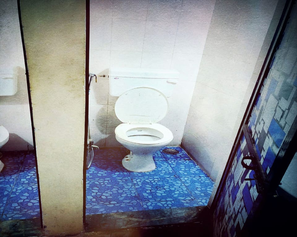 Basic Shared Dormitory | Bathroom | Shower, towels, soap, shampoo