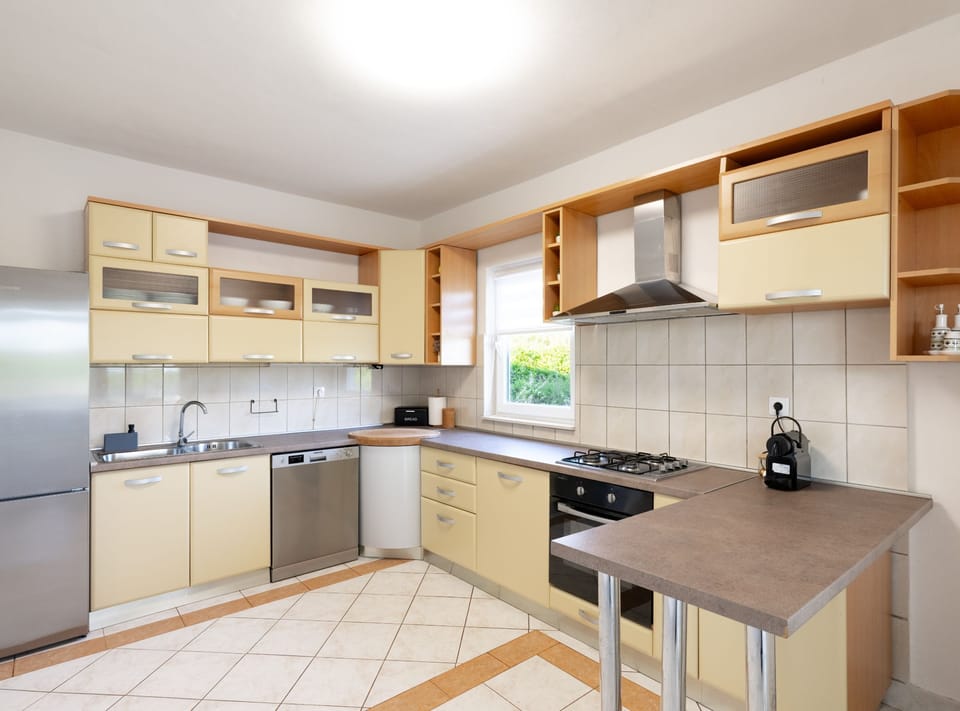 House (Three-Bedroom House) | Private kitchen | Fridge, cookware/dishes/utensils