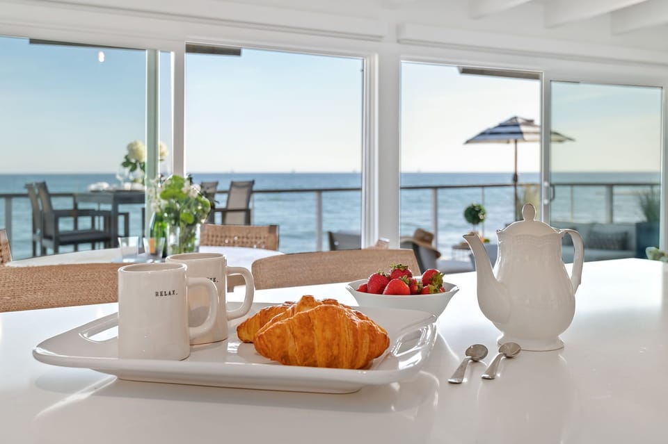 Enjoy your breakfast and morning cup of coffee while listening to waves crash below