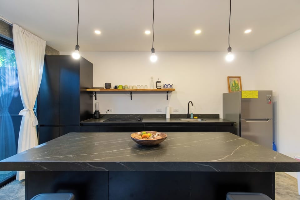 Kitchen with sliding door entrance to the side