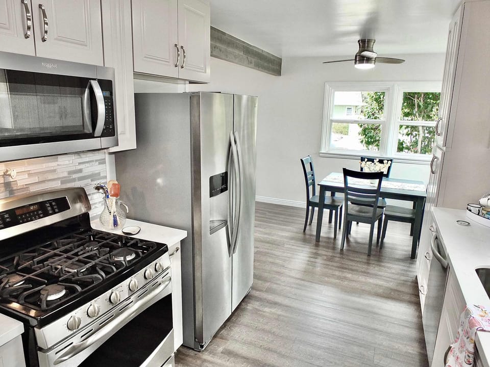 A fully equipped kitchen and dining area offering a perfect blend of style and functionality