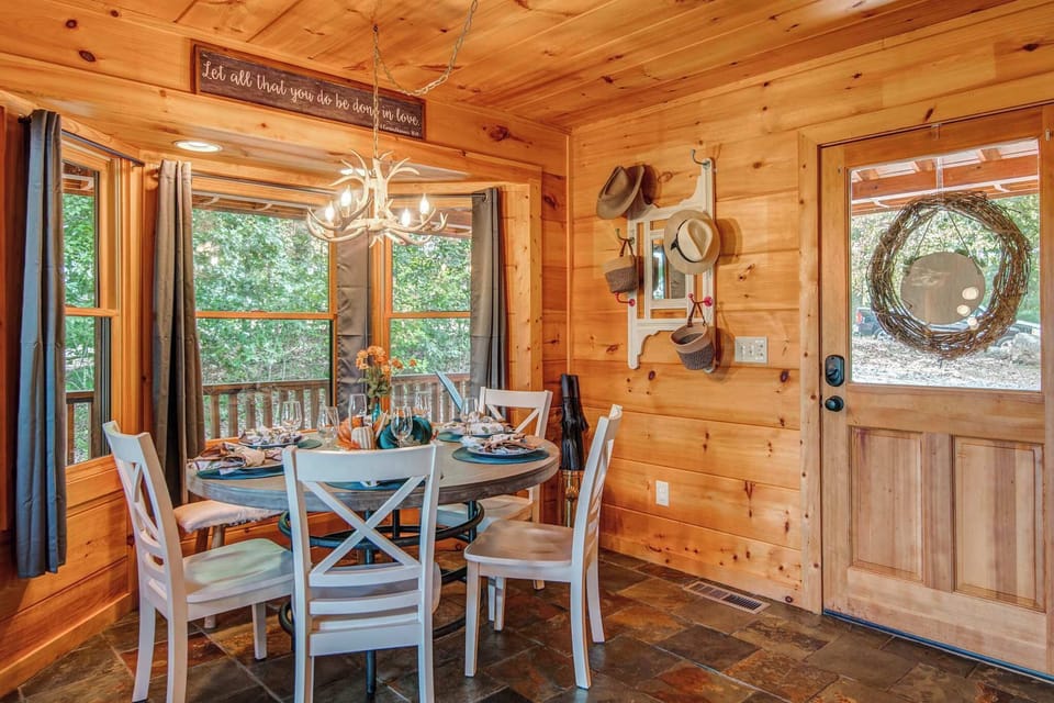 Gather for elegant meals together at the dining table, offering seating for 6