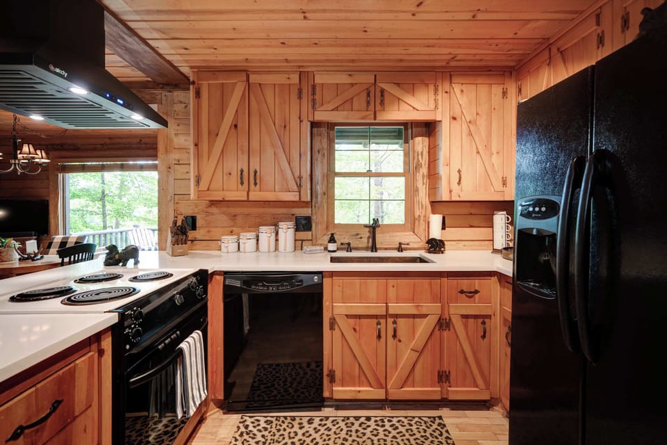 The open, airy kitchen offers ample space & all the comforts of home