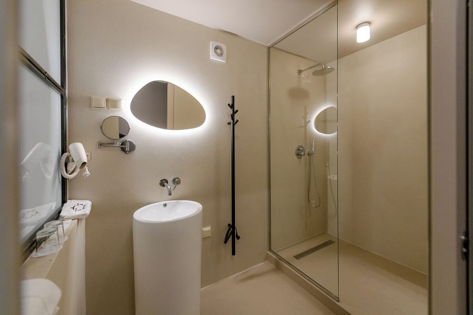 Superior Double or Twin Room | Bathroom | Hair dryer, towels, soap, shampoo