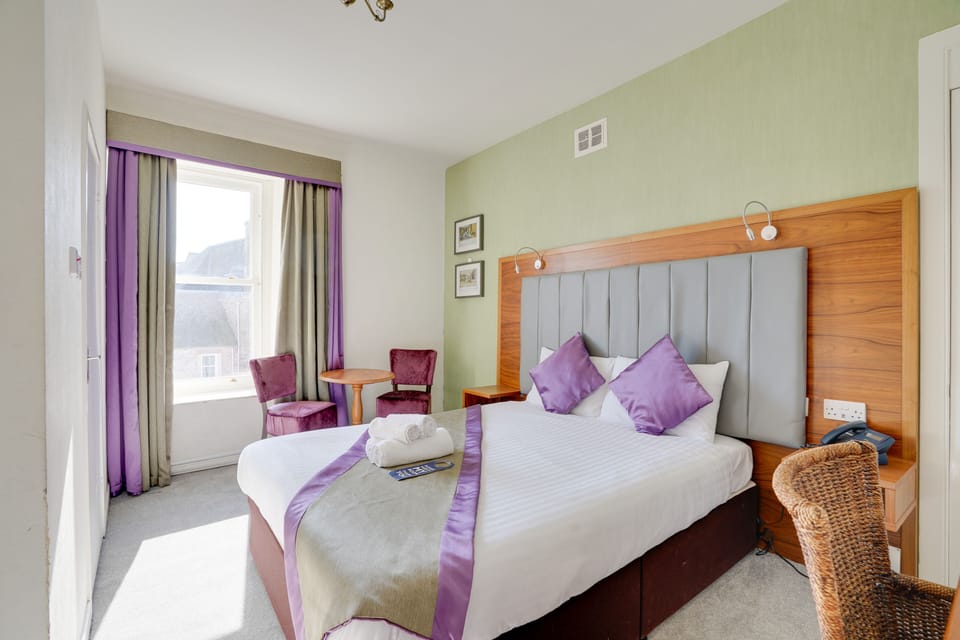 Laptop workspace, iron/ironing board, free WiFi, bed sheets