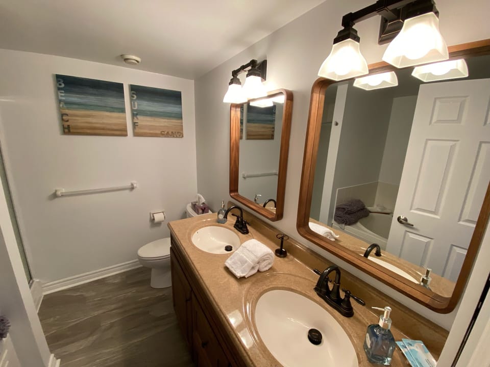Full bathroom, soaker tub, separate shower and double sinks.
