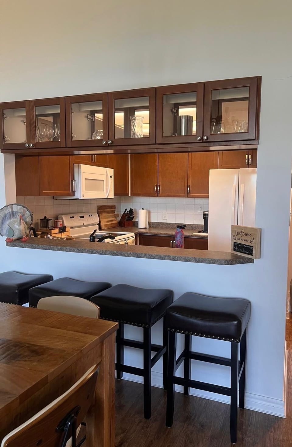 Start your day at the inviting breakfast bar with sleek bar stools.
