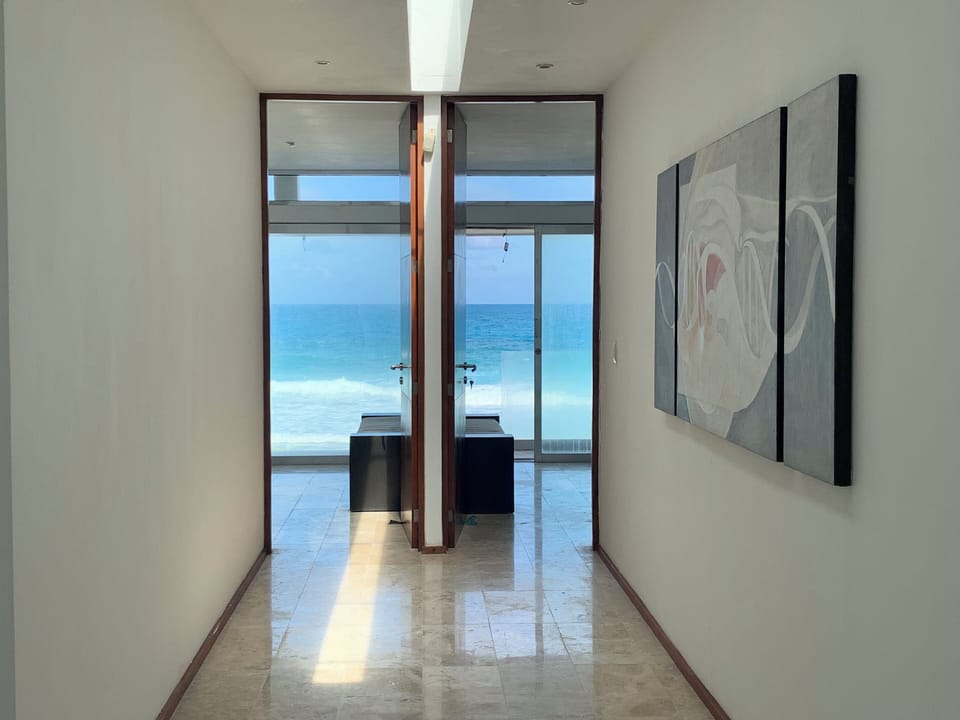 Hallway leading to two master bedrooms