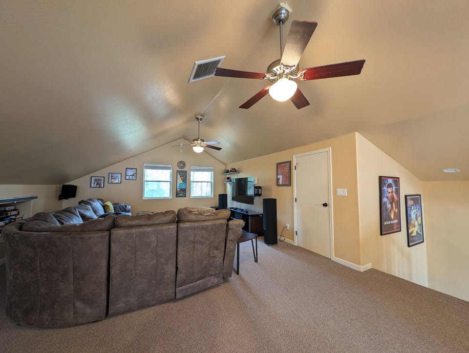 Loft area L-shaped couch with pullout sofa bed