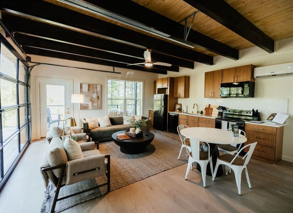 Open-concept living, dining, and kitchen space designed for gathering together