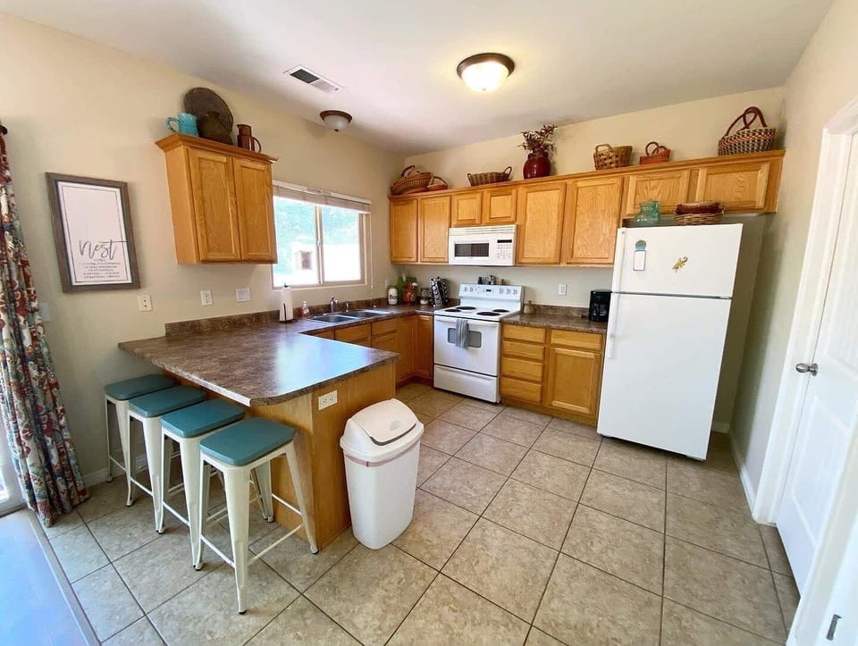 The kitchen is fully equipped and stocked to be your culinary home away from home.