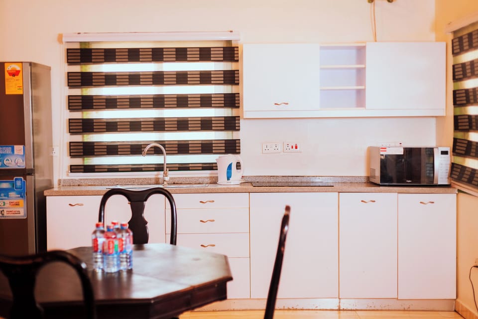 Exclusive Apartment, 2 Bedrooms, Sea View | Private kitchen | Full-size fridge, microwave, stovetop, paper towels