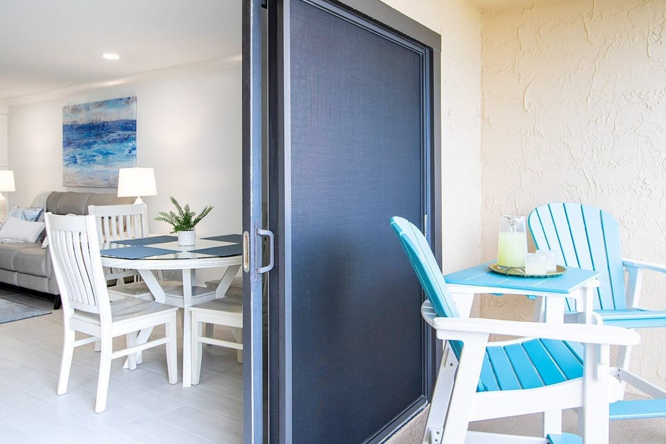 Balcony area with outside tables and chairs
