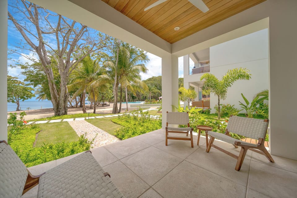 front porch steps from the sand and water