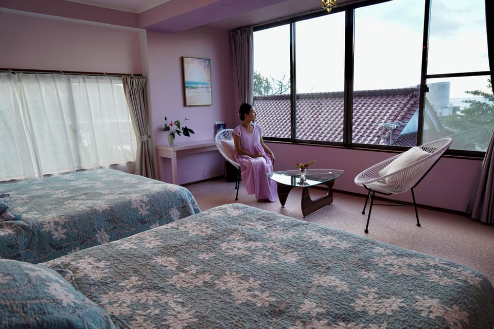 Luxury Twin Room, Partial Ocean View | Laptop workspace, WiFi (free)