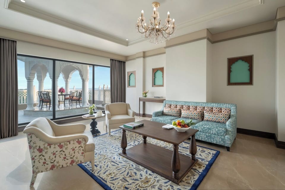 Suite, 1 King Bed (Luxury Suite) | Living area | 42-inch LED TV with satellite channels