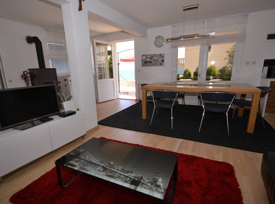 Villa (Three Bedroom Villa with Pool) | Living room | 32-inch flat-screen TV with cable channels