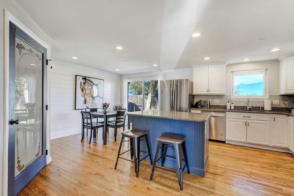 Spacious Kitchen and Dining Area – Fully equipped for your culinary needs, with a cozy dining space to enjoy meals together.