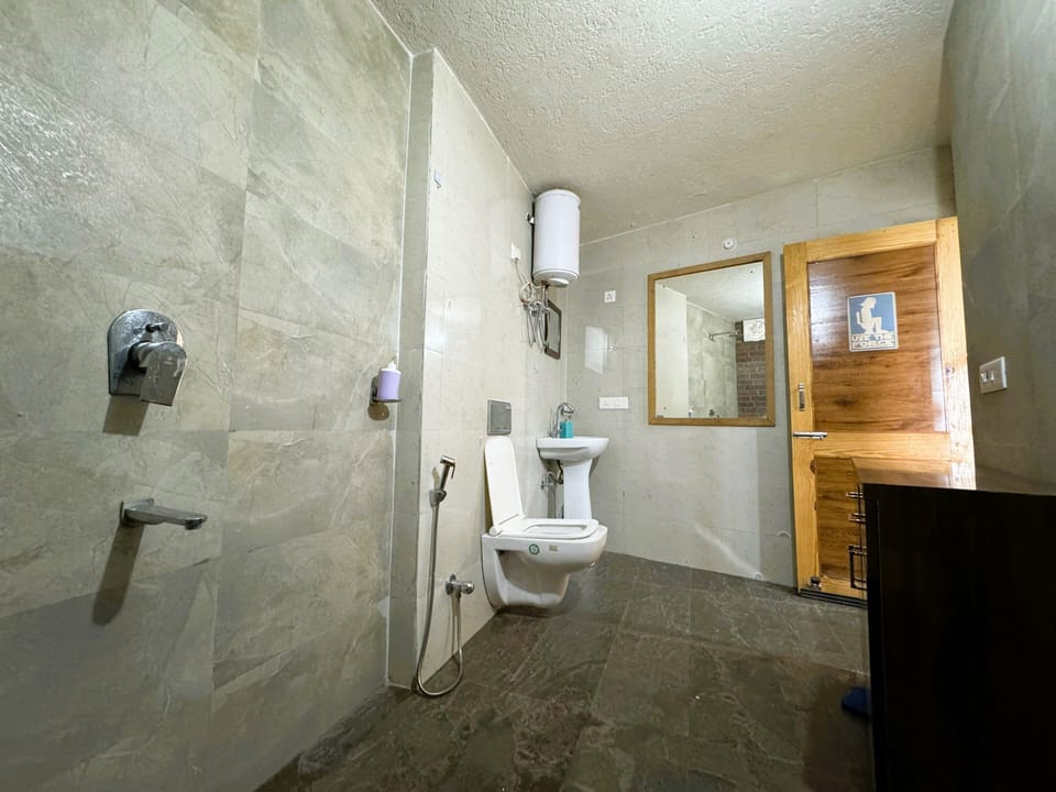 Family Studio Suite, Mountain View | Bathroom | Shower, slippers, towels, soap