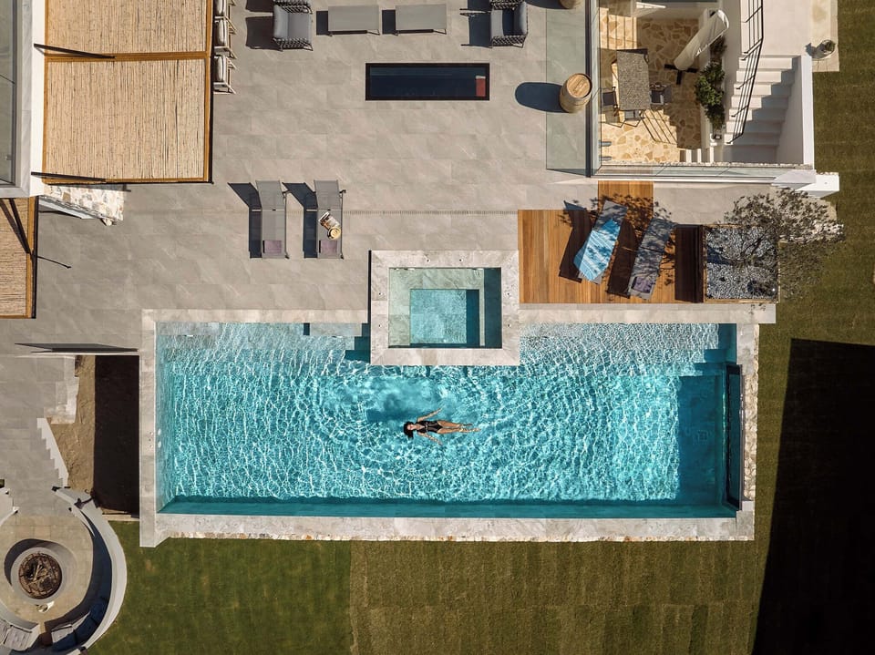 Relax and unwind at the 90m² infinity heated pool. 