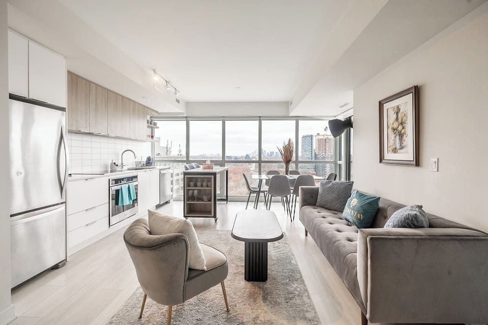 Deluxe Condo, 2 Bedrooms, Balcony, City View | Living area | 43-inch flat-screen TV with digital channels, Netflix
