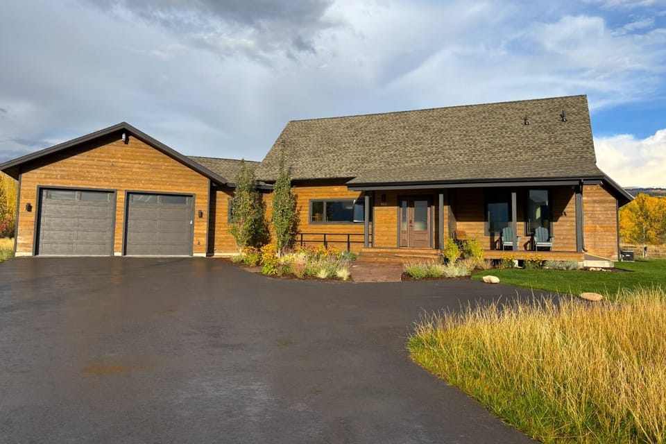 With a chic mountain-modern design to complement useful amenities, such as a spacious garage, this home has plenty to offer any group.