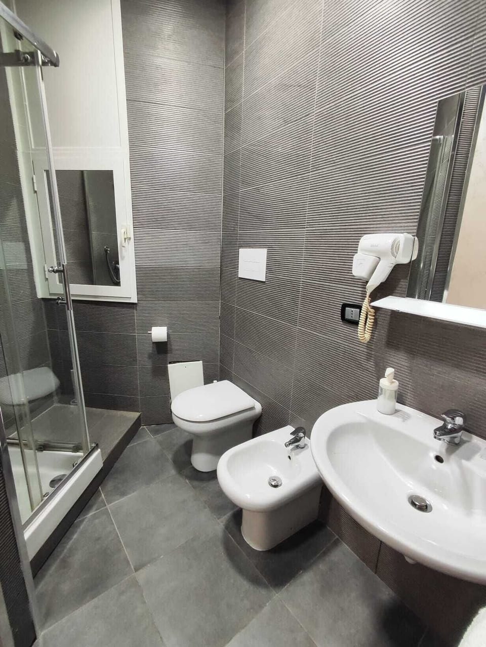 Deluxe Suite, Balcony, City View | Bathroom | Free toiletries, hair dryer, towels, soap