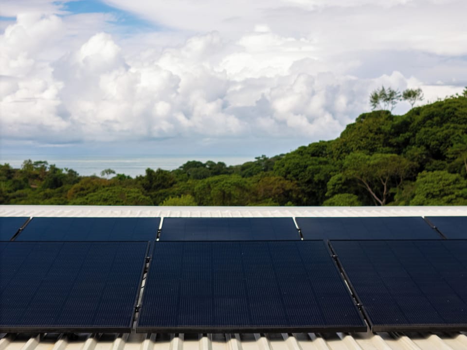 This energy-efficient house is powered by solar panels, offering clean, sustainable energy.