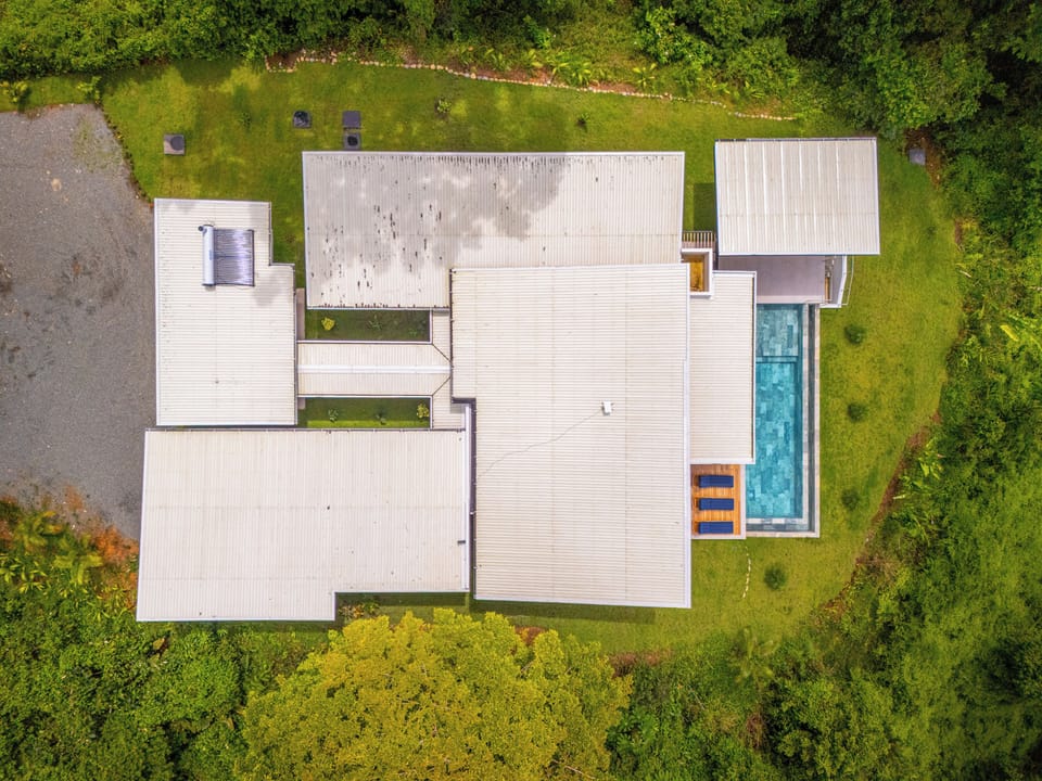 An elegant property with an exceptional design and a beautiful pool, creating a perfect oasis for relaxation.
