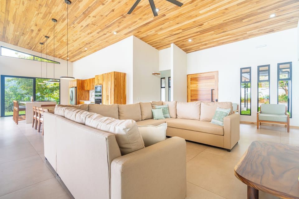 A large, inviting living space with breathtaking views and plush, cozy seating.