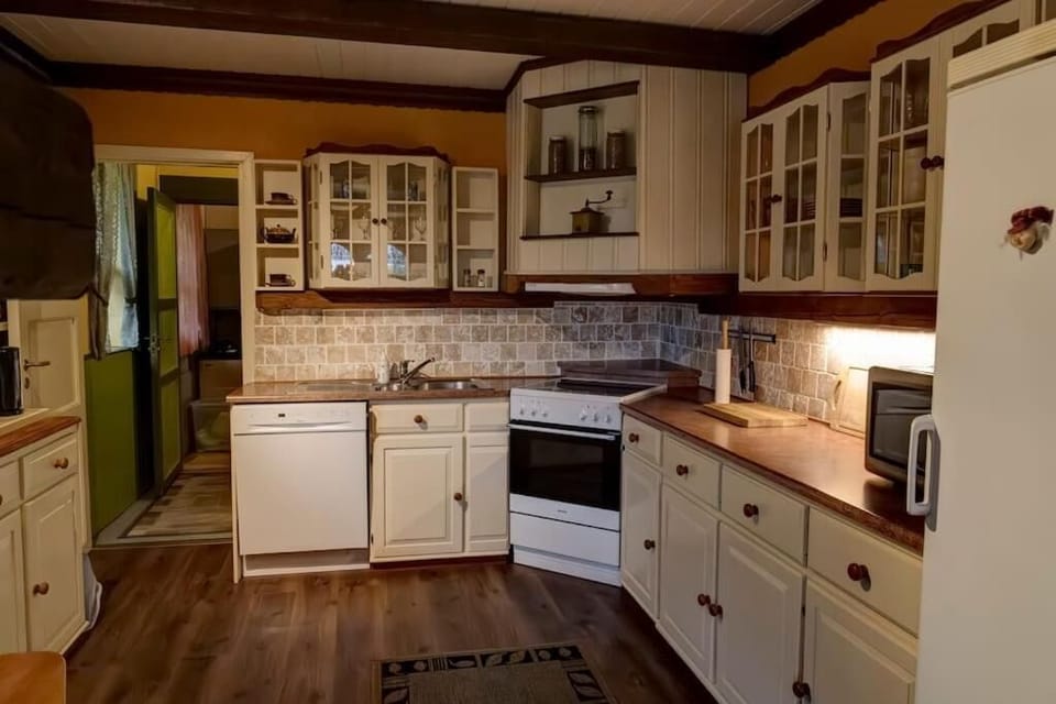 Villa | Private kitchen | Electric kettle, highchair