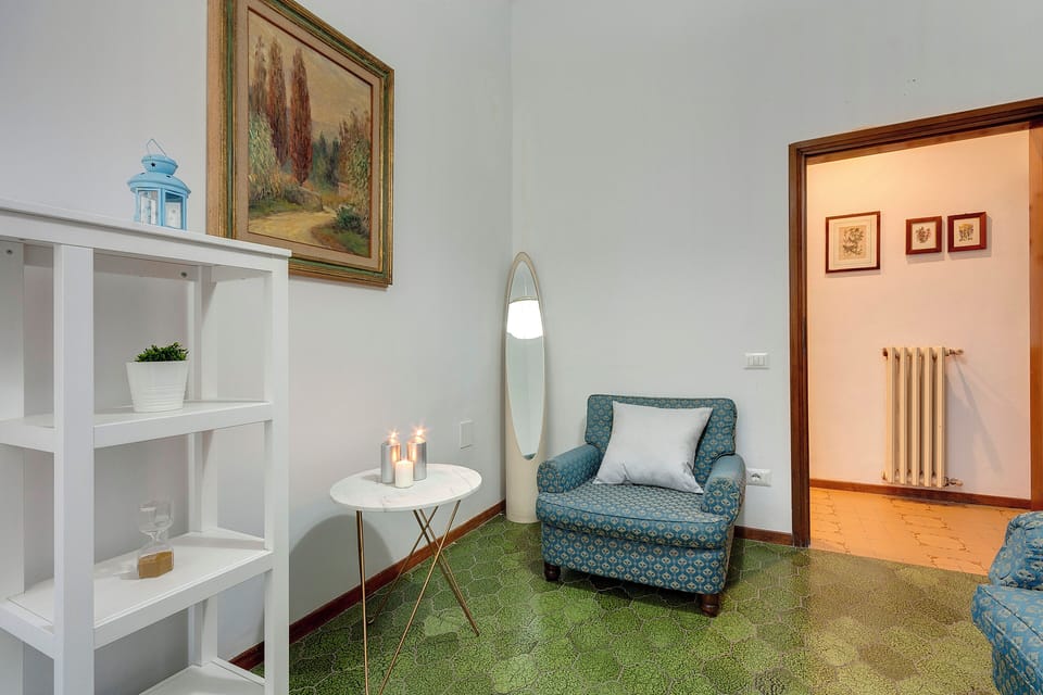 Apartment, Garden View | Living area | 24-inch flat-screen TV with digital channels