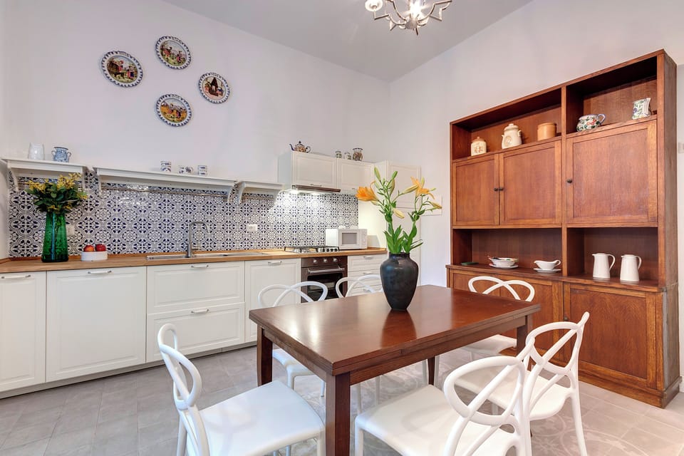 Apartment, Garden View | Private kitchen | Full-size fridge, microwave, oven, dishwasher