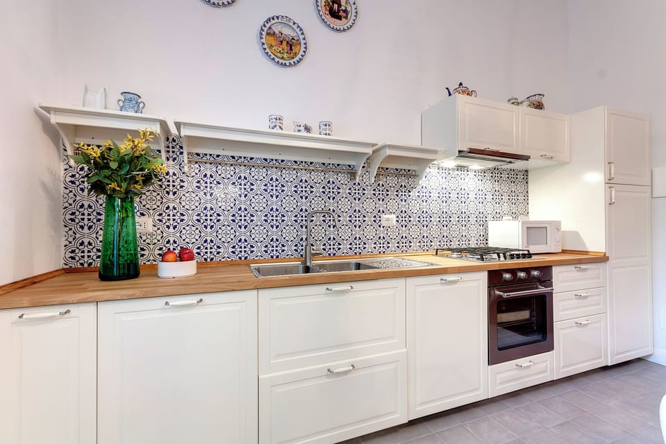 Apartment, Garden View | Private kitchen | Full-size fridge, microwave, oven, dishwasher