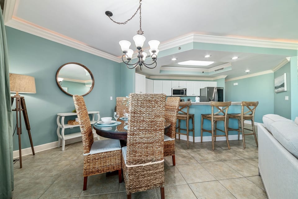 The modern kitchen island with bar seating offers a casual dining option, while the open layout maximizes natural light and showcases the stylish finishes throughout.