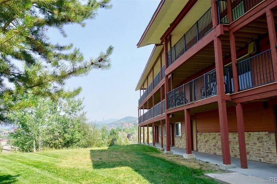 Exterior of the building in the summer time.