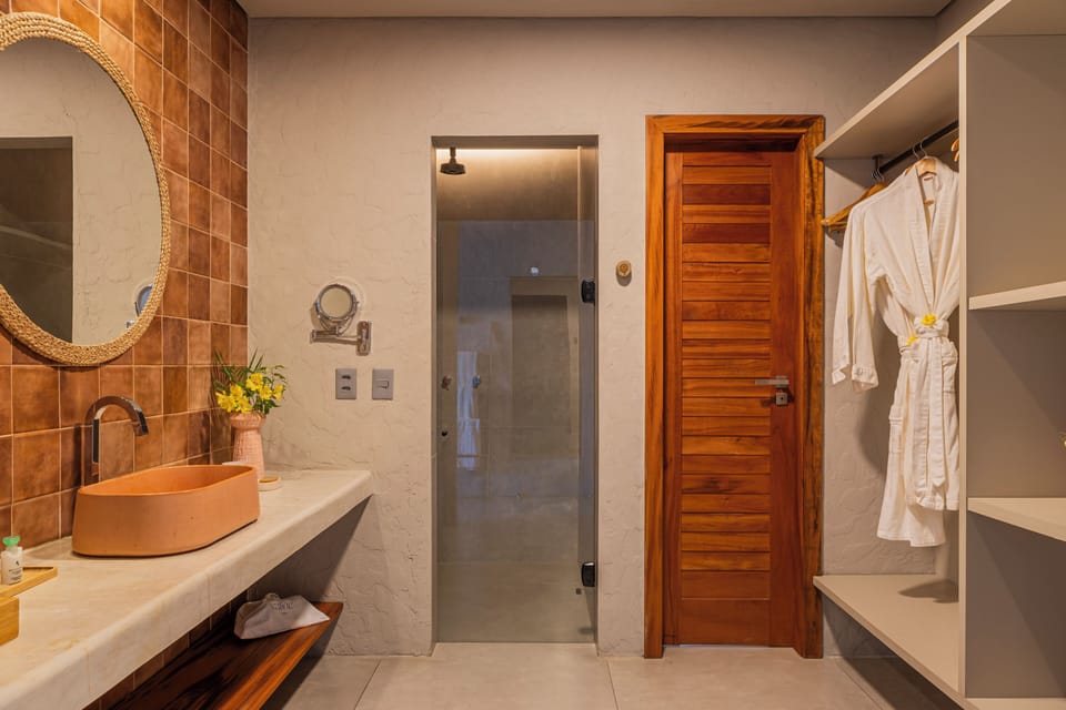 Estel Suite | Bathroom | Shower, designer toiletries, hair dryer, bathrobes